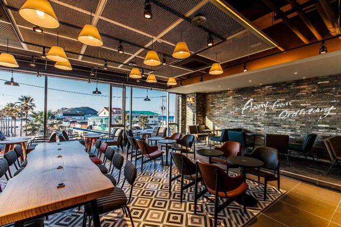 Imagen del bar/restaurante del Hotel Bluespring Boutique. Foto 6