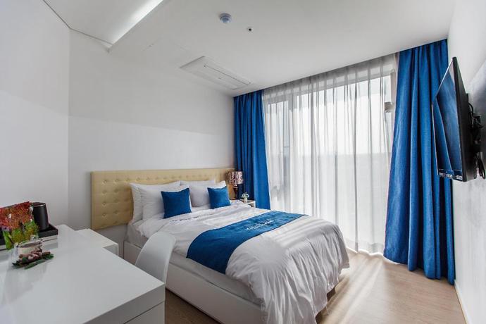 Imagen de la habitación del Hotel Bluespring Boutique. Foto 8