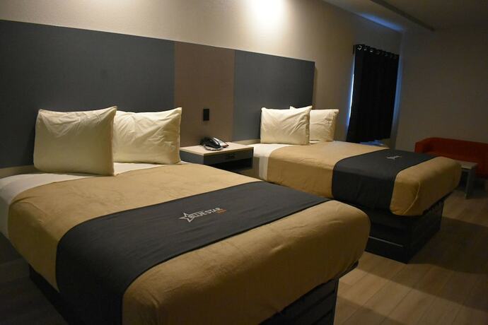 Imagen de la habitación del Hotel Bluestar Inn. Foto 16