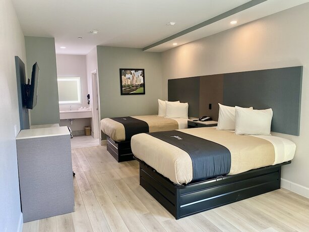 Imagen de la habitación del Hotel Bluestar Inn. Foto 17