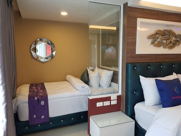 Imagen de la habitación del Hotel Bluetel Re'sidence Bangkok Impact. Foto 17