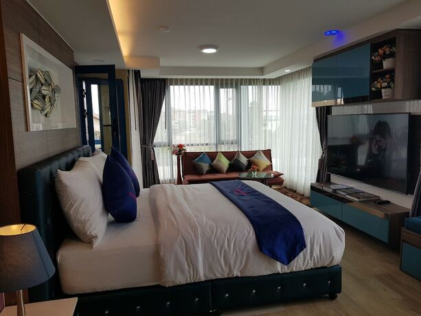 Imagen de la habitación del Hotel Bluetel Re'sidence Bangkok Impact. Foto 18