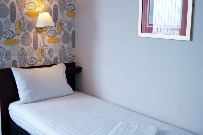 Imagen de la habitación del Hotel Bluewaters. Foto 8