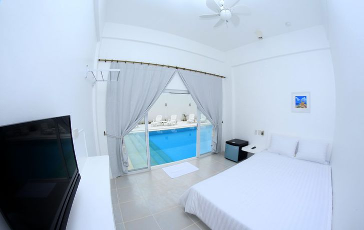 Imagen de la habitación del Hotel Bluewave Hotel. Foto 5