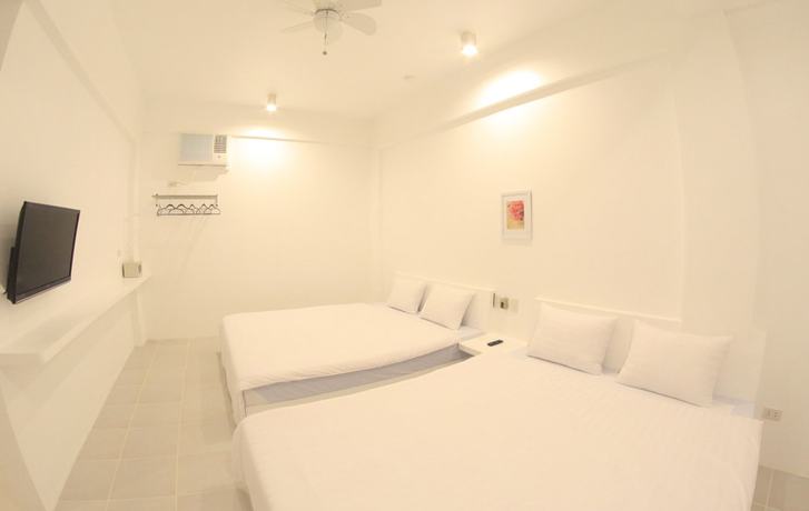 Imagen de la habitación del Hotel Bluewave Hotel. Foto 9