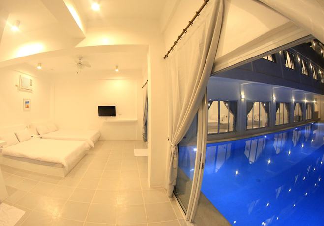 Imagen de la habitación del Hotel Bluewave Hotel. Foto 16