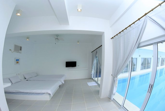 Imagen de la habitación del Hotel Bluewave Hotel. Foto 17