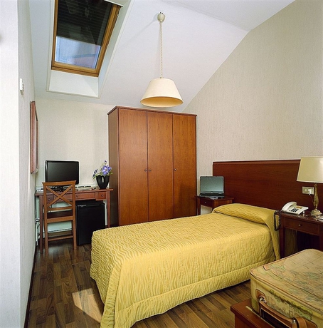 Imagen de la habitación del Hotel Blumen, Bolonia. Foto 3
