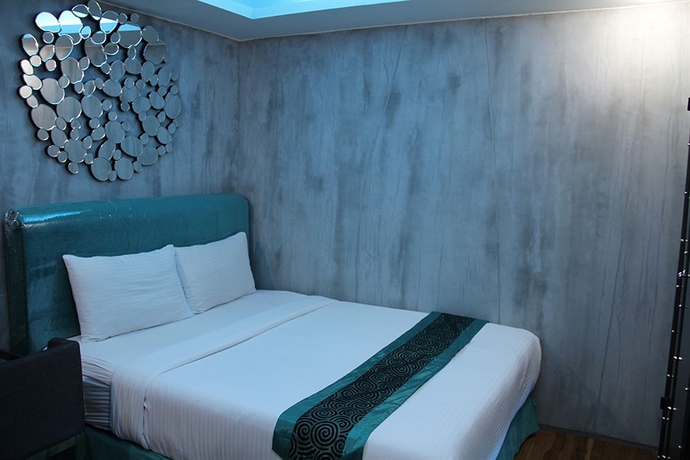 Imagen de la habitación del Hotel Blutique. Foto 11