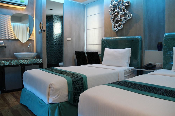 Imagen de la habitación del Hotel Blutique. Foto 13