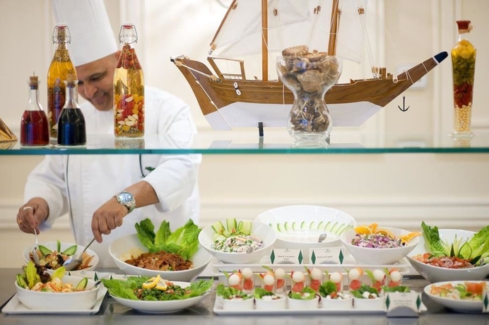 Imagen del bar/restaurante del Hotel Bm Acacia and Apartments. Foto 3