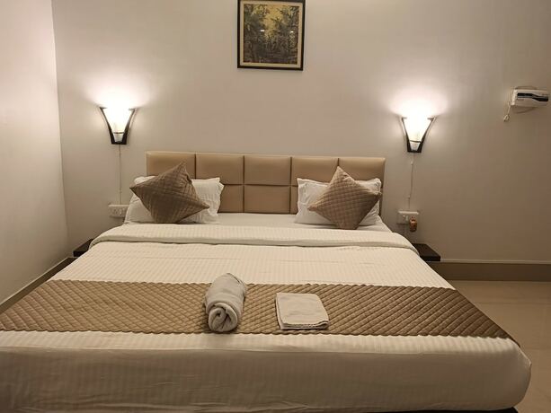 Imagen de la habitación del Hotel Bmg Urban Stay. Foto 21