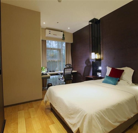 Imagen de la habitación del Hotel Bo Lian Hui Fashion. Foto 10