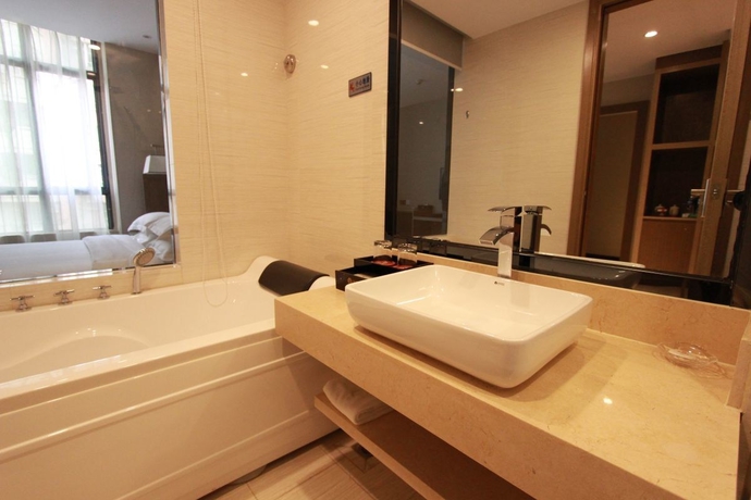 Imagen de la habitación del Hotel Bo Yi. Foto 10