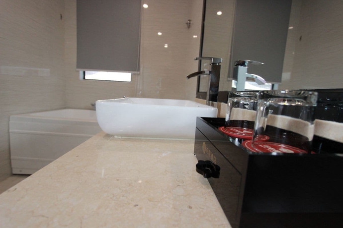 Imagen de la habitación del Hotel Bo Yi. Foto 13