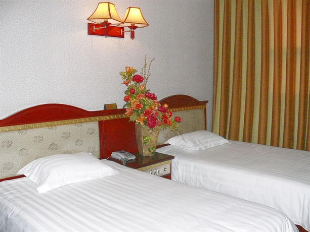 Imagen de la habitación del Hotel BoTai Hotel. Foto 3