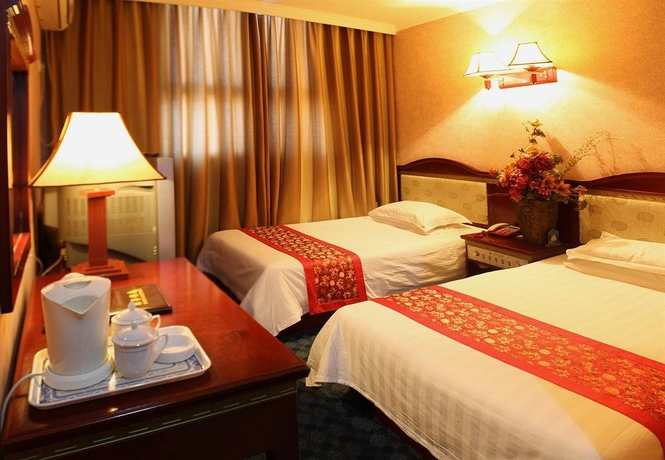 Imagen de la habitación del Hotel BoTai Hotel. Foto 5