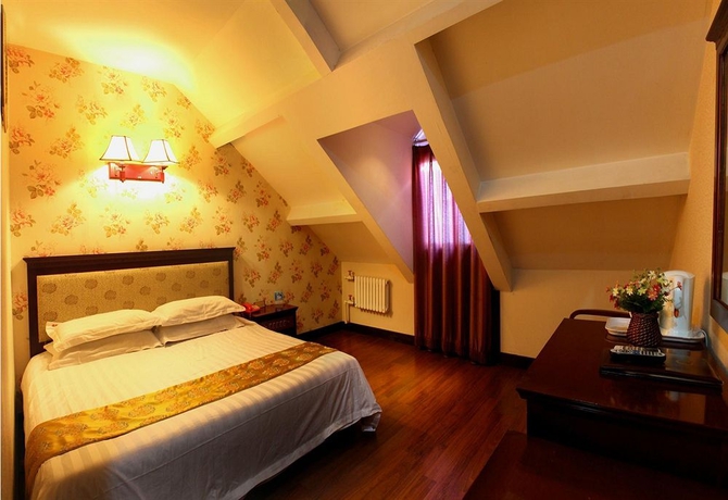 Imagen de la habitación del Hotel BoTai Hotel. Foto 7