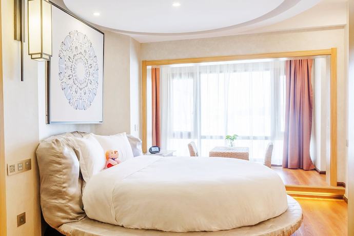 Imagen de la habitación del Hotel BoXin Hotel. Foto 4