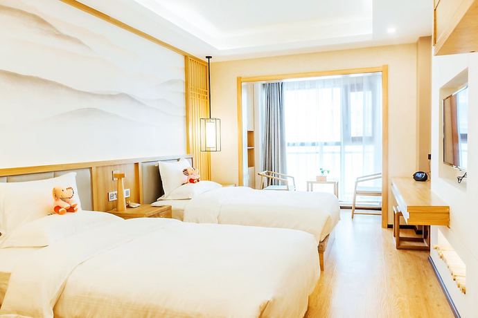 Imagen de la habitación del Hotel BoXin Hotel. Foto 7