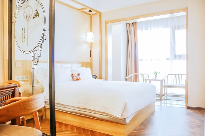 Imagen de la habitación del Hotel BoXin Hotel. Foto 11