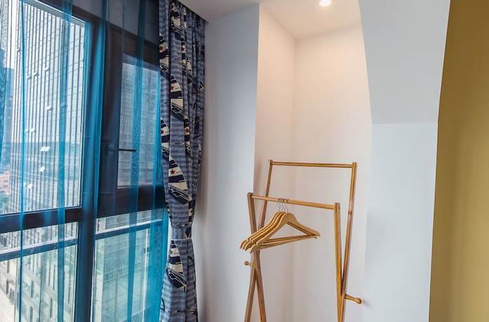 Imagen de la habitación del Hotel BoXin Hotel. Foto 15