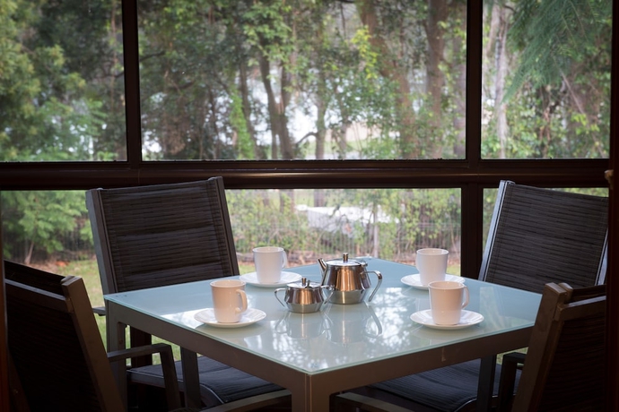 Imagen del bar/restaurante del Hotel Boambee Bay Resort. Foto 6
