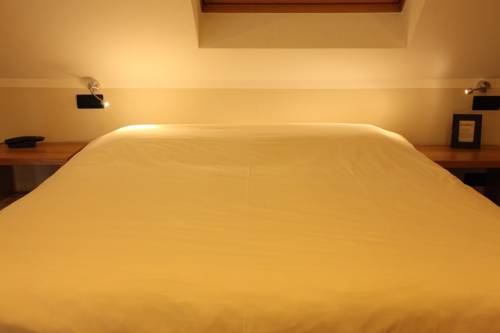 Imagen de la habitación del Hotel Boardhouse. Foto 9