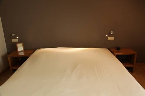 Imagen de la habitación del Hotel Boardhouse. Foto 12