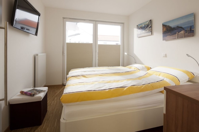 Imagen de la habitación del Hotel Boardinghaus Norderney. Foto 15