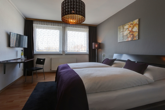 Imagen de la habitación del Hotel Boardinghouse Mundsburg. Foto 5