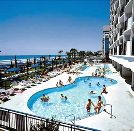 Imagen de la piscina del Hotel Boardwalk Beach Resort. Foto 16