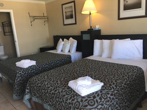 Imagen de la habitación del Hotel Boardwalk Charlee and Beach House Rentals. Foto 10