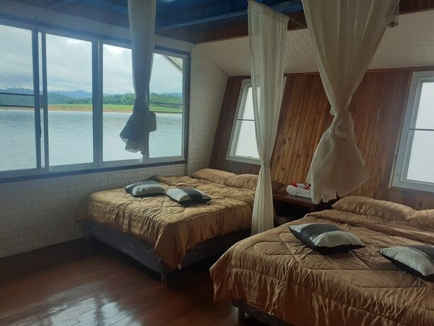Imagen de la habitación del Hotel Boat House Suriya. Foto 3