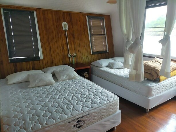 Imagen de la habitación del Hotel Boat House Suriya. Foto 13