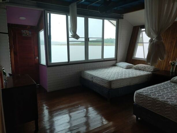 Imagen de la habitación del Hotel Boat House Suriya. Foto 16