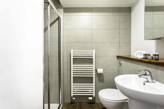 Imagen de la habitación del Hotel Bob W Tower Hill Residences. Foto 11