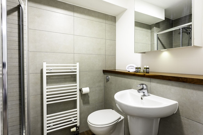 Imagen de la habitación del Hotel Bob W Tower Hill Residences. Foto 17