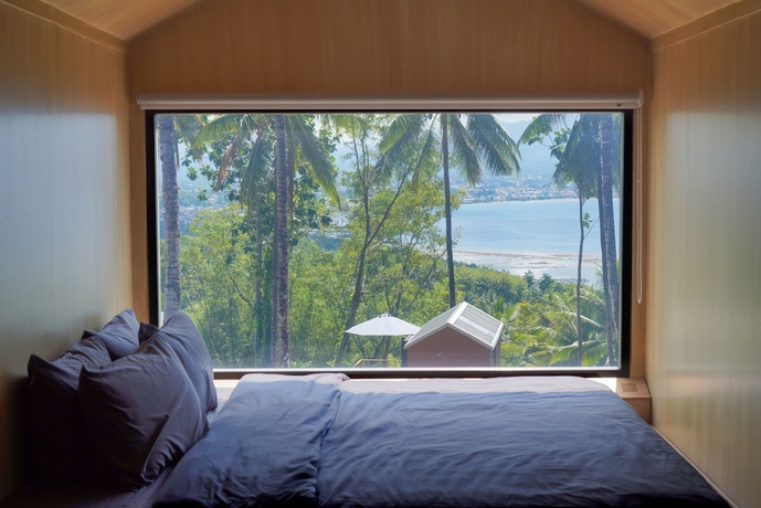 Imagen de la habitación del Hotel Bobocabin Bunaken Hills. Foto 7