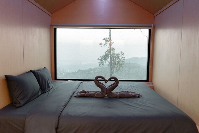 Imagen de la habitación del Hotel Bobocabin Dieng Wonosobo. Foto 7