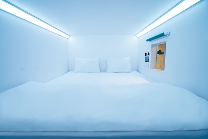 Imagen de la habitación del Hotel Bobopod Dago, Bandung. Foto 8