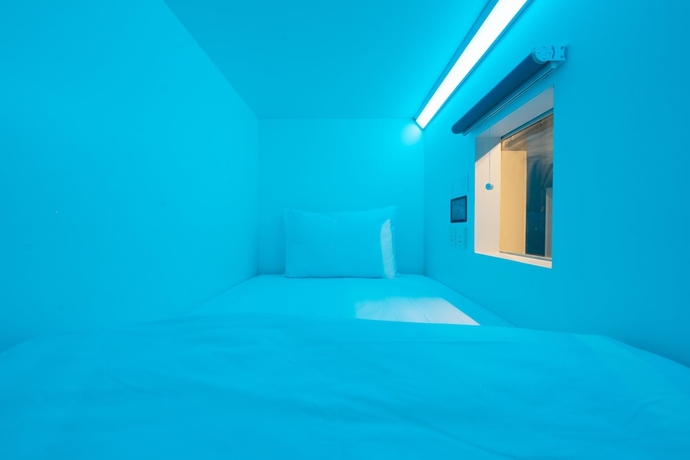 Imagen de la habitación del Hotel Bobopod Kota Lama Semarang. Foto 2
