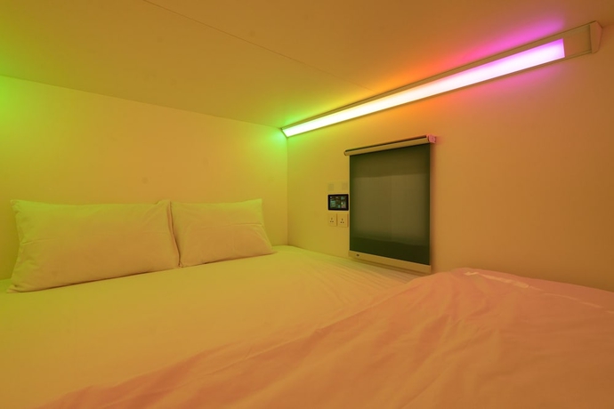 Imagen de la habitación del Hotel Bobopod Kota Lama Semarang. Foto 10