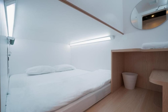 Imagen de la habitación del Hotel Bobopod Kota Tua Jakarta. Foto 6