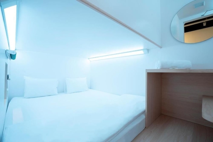 Imagen de la habitación del Hotel Bobopod Malioboro Yogyakarta. Foto 4