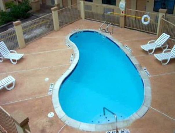 Imagen de la piscina del Hotel Boca Chica Inn and Suites Brownsville. Foto 12