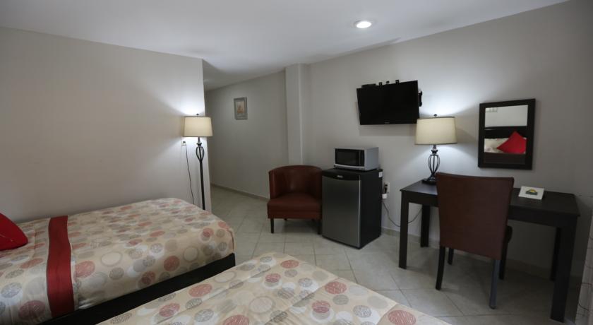 Imagen de la habitación del Hotel Boca Inn and Suites. Foto 3
