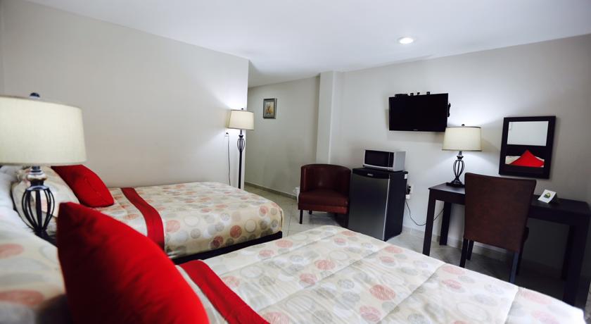 Imagen de la habitación del Hotel Boca Inn and Suites. Foto 4