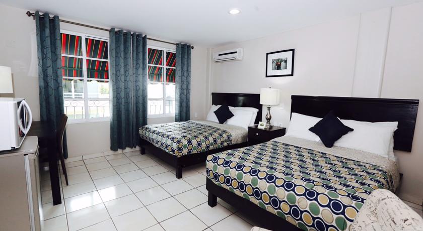 Imagen de la habitación del Hotel Boca Inn and Suites. Foto 5
