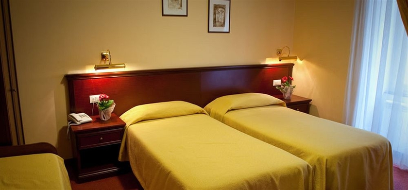 Imagen de la habitación del Hotel Boccascena. Foto 7